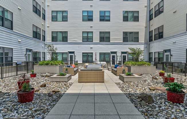 Courtyard of an apartment building with gravel and plants at The View at Old City, Philadelphia