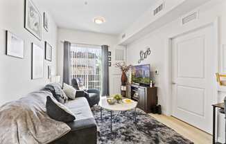 a living room with a couch and a coffee table
