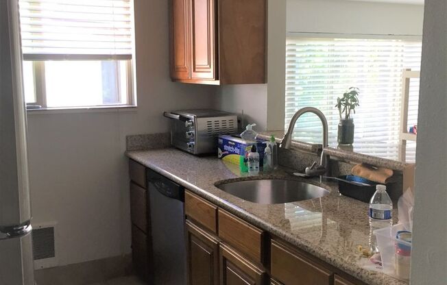 11744 SW Boones Bend Drive ~ Beautiful Loaded Townhome