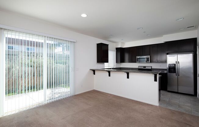 Spacious Two Bedroom Townhouse in Imperial Beach with Washer/Dryer and Garage!