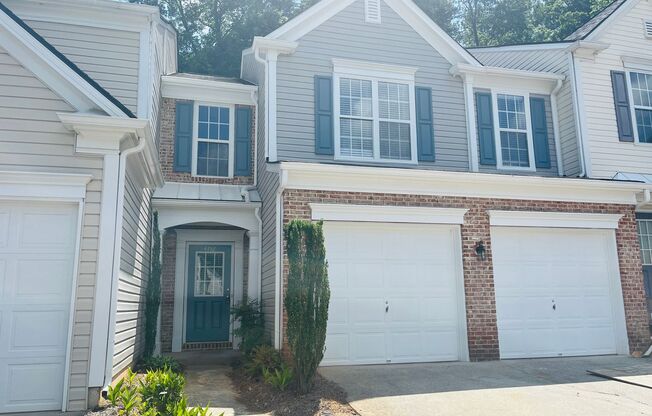 Wow! Check out this charming 3-bedroom, 2-bathroom townhome located in Kennesaw!