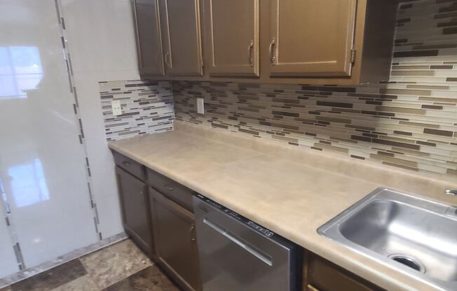 Spacious 3 BR+study/2.5 bath end-unit townhome w/balcony & patio!