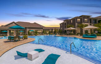 Pool And Sundeck at Cue Luxury Apartments, Cypress, TX, 77433