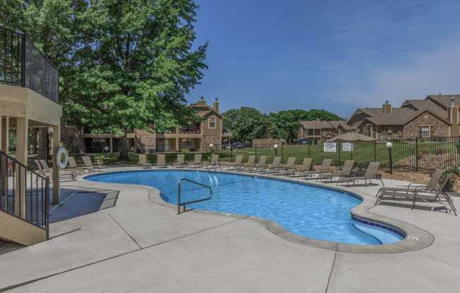Pool With Sunning Deck at Waterford Place Apartments & Townhomes, Kansas