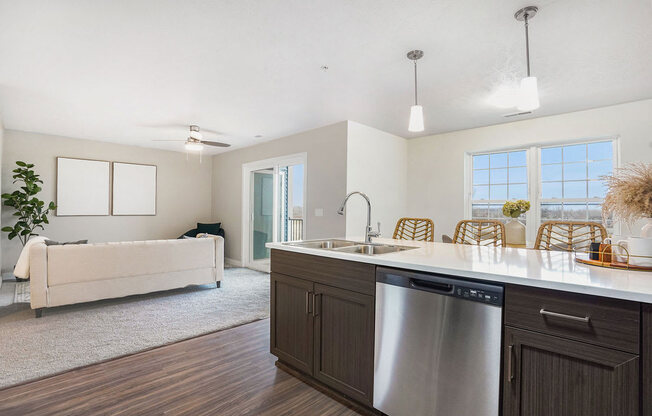 Kitchen with Dishwasher at Meadowbrooke Apartment Homes in Kentwood, MI 49512