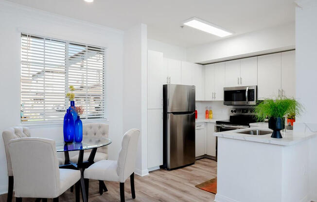 Kitchen With Dining Area at The Missions at Rio Vista, San Diego, 92108