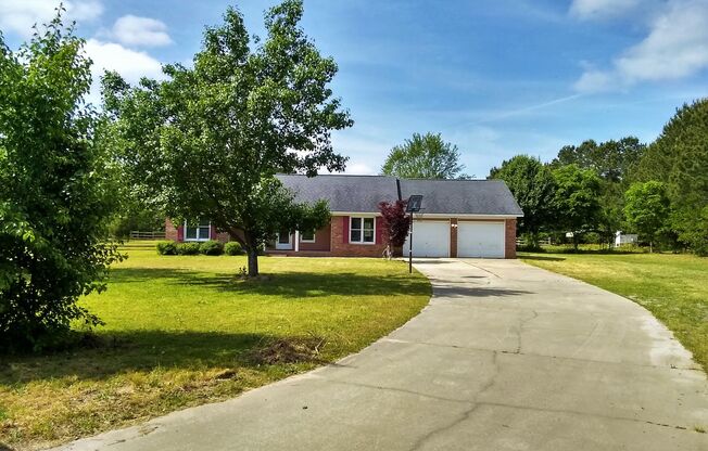 COUNTRY LIVING AT ITS BEST!!! Gorgeous 3 Bedroom / 2.5 Bathroom Ranch in Grays Creek District!