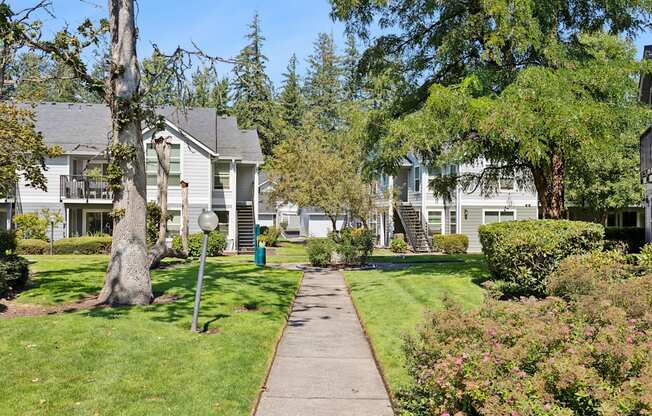 A residential area with houses and greenery.
