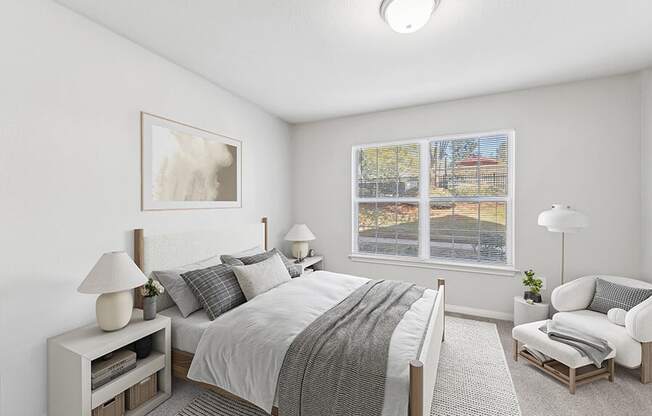 Model Bedroom with Carpet and Window View at Lake Cameron Apartments located in Apex, NC.