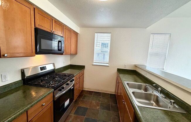 Freshly Painted w/ New Carpets 3 Bedroom, 2 Bath With Attached Garage