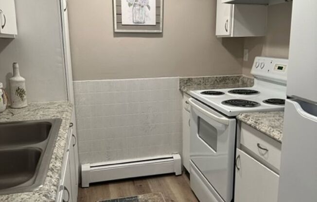 Updated Condo with outdoor Pool  ***Next to CMU***