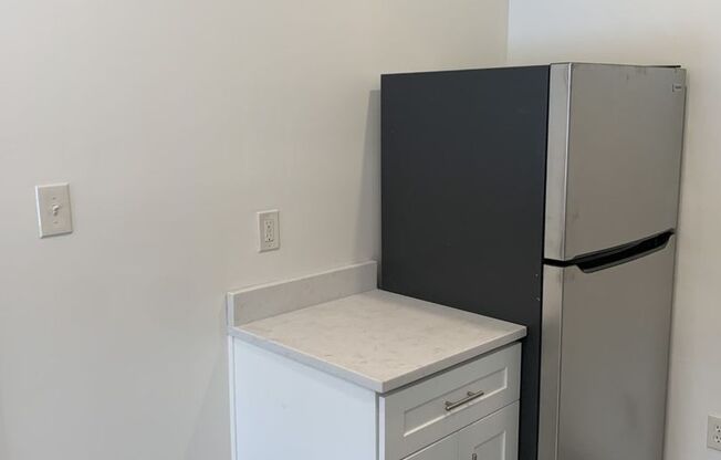 Great Morningside Row House with Front Porch!