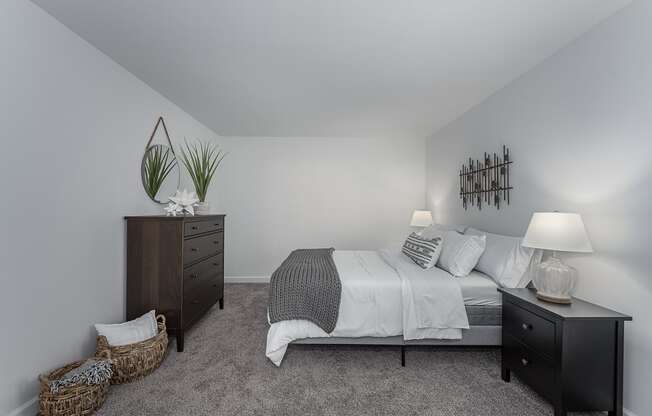 White interior bedroom with bed at SoDel, Kettering, OH, 45429