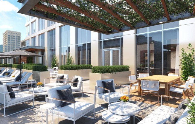 a rendering of a terrace with tables and chairs on the roof of a building at The Paxton, Brooklyn, 11201