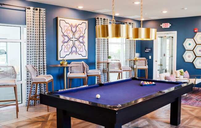 play a game of pool in our games room
