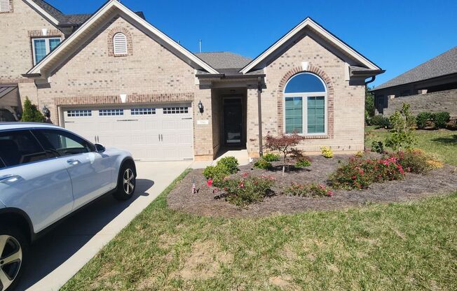 One Level Townhouse with a Double Garage!