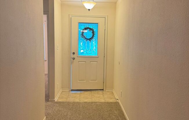 Welcome home to 10115 Red Iron Creek!