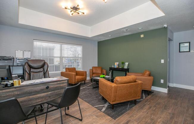 a living room filled with furniture and a large window