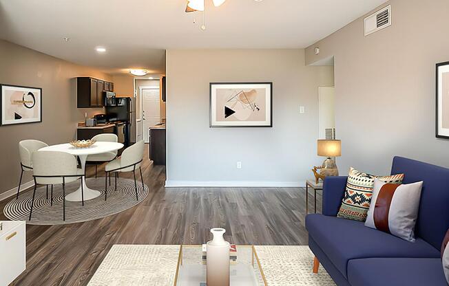 a living room filled with furniture and a flat screen tv