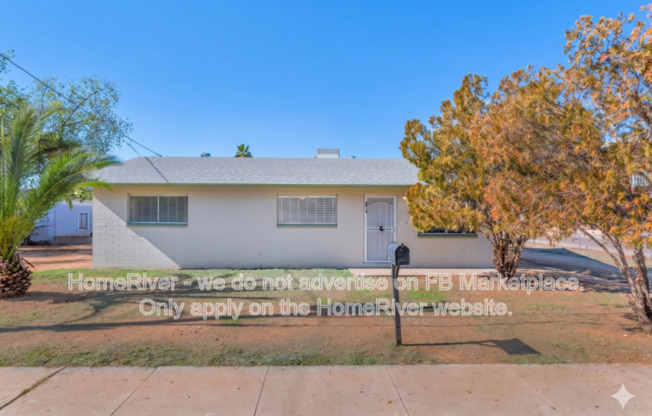 8916 N 11 ST