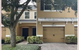 Lovely 3/2.5 Spacious Townhome with a 2 Car Garage in the Highly Desired Gated Community Oasis Cove at Lakeside Village - Windermere!