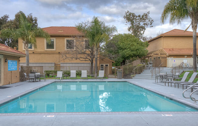 Pool with lounge chairs Home Rentals in Richmond CA at Bella Vista at Hilltop