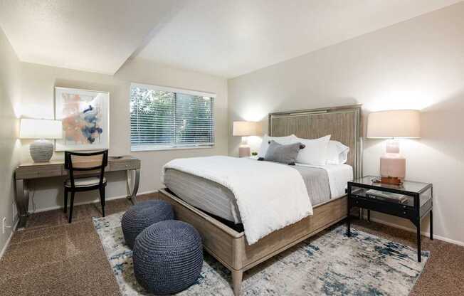 a bedroom with a bed and a round window