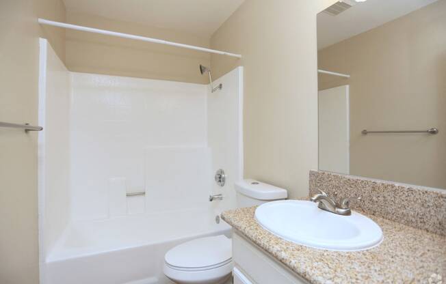 Bathroom showing Shower toilet and sink