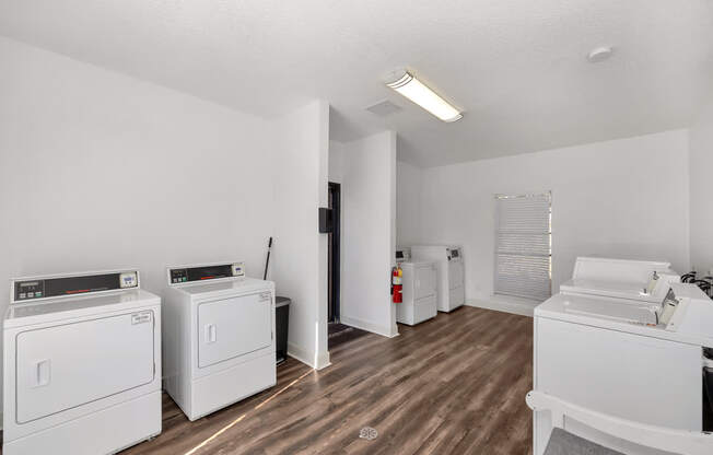 A laundry room with a washer and dryer.