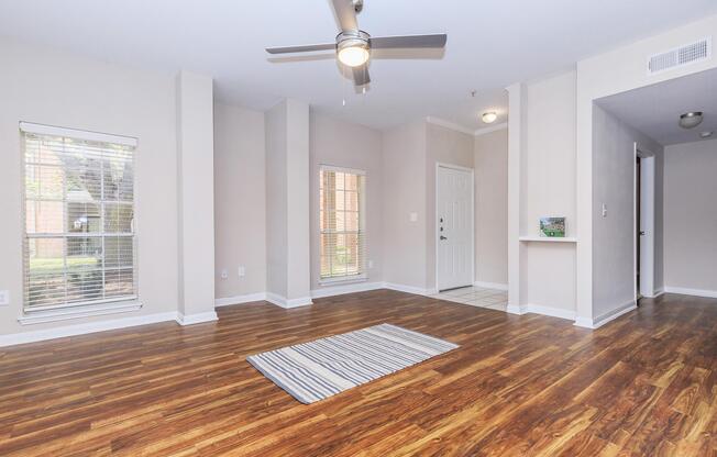 a room filled with furniture and a large window