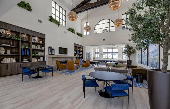 a living room filled with furniture and a large window