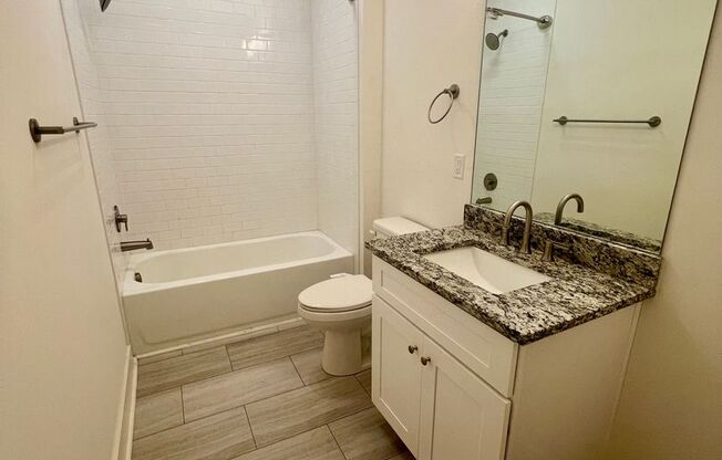 1 Bed 1 Bath Condo Minutes to Downtown w/ Dedicated Parking $1200