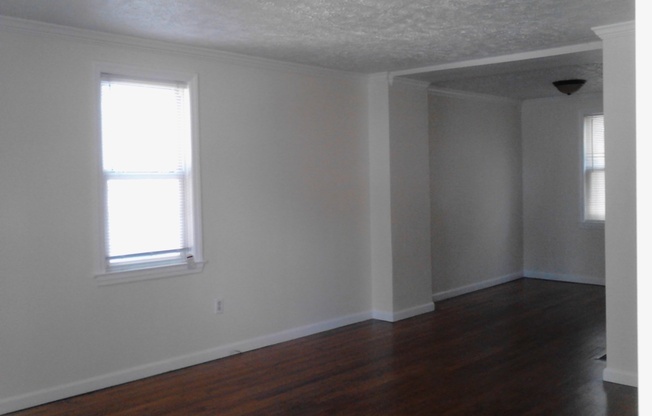 Cozy 2 Bedroom Semi-Attached Home on Quiet Cul-de-Sac! Recently Updated and Freshly Painted! Hardwood Floors!