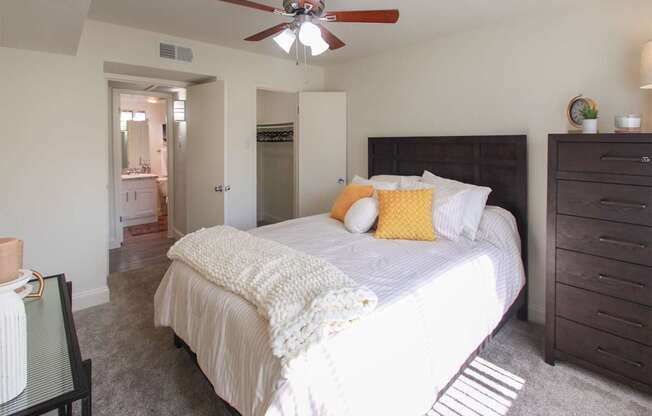 This is a photo of the bedroom in the 558 square foot 1 bedroom, 1 bath model apartment at The Summit at Midtown Apartments in Dallas, TX.