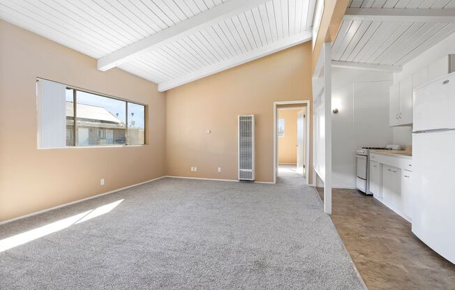 Carpeted Living Room at St. Andrews Apartments in Los Angeles