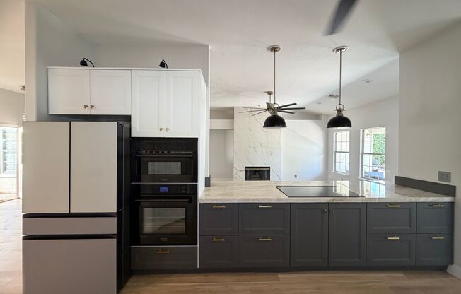 BEAUTIFULLY UPGRADED SINGLE FAMILY HOME - 3 BEDROOM, CORNER LOT WITH VAULTED CEILINGS