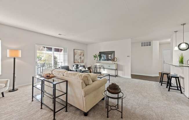 a living room with a couch and a table