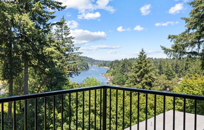 Luxury Lake Oswego 3-Bedroom Riverfront Condo with Panoramic River Views, Pools & Fitness Center