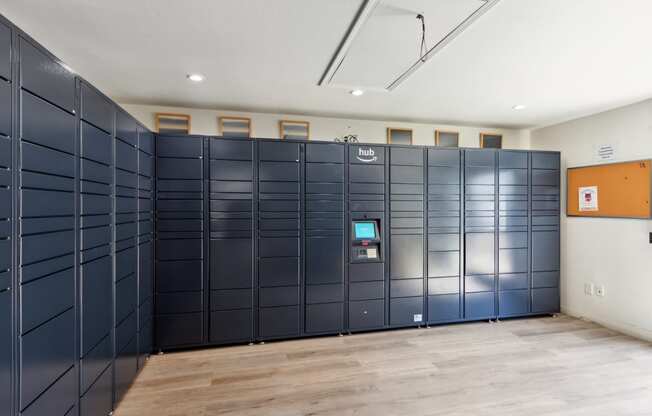 a row of lockers in a room with a wooden floor