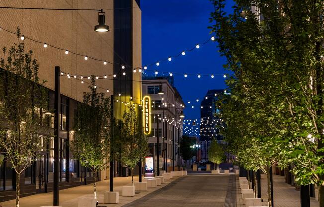Twinkling lights, tree-lined walkways, and local charm—steps from your front door at the Pinnacle at Nashville Yards. Discover the vibrant heart of the city.