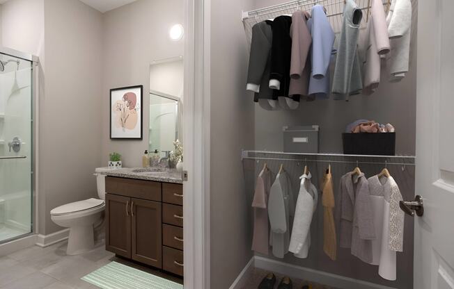 a bathroom with a shower and a sink and a rack of towels on the wall