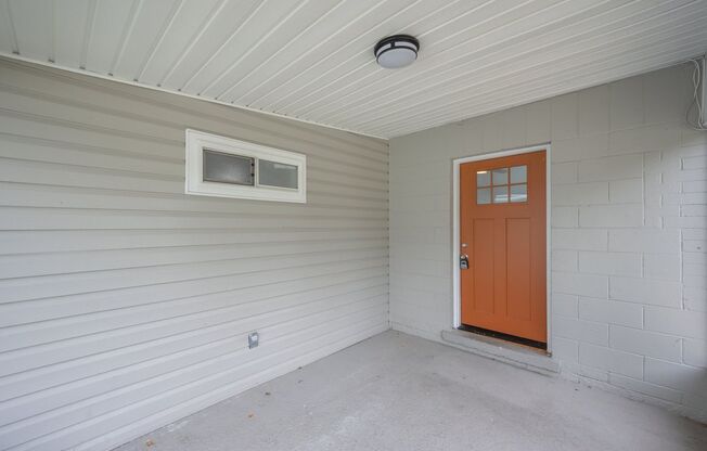 Renovated 3-Bedroom Duplex with Large Fenced Backyard
