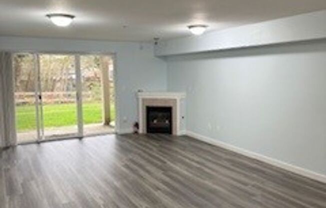 2 bedroom 2 bath First Floor Condo w/1 Car Garage W/O to Greenspace $2350 per month.