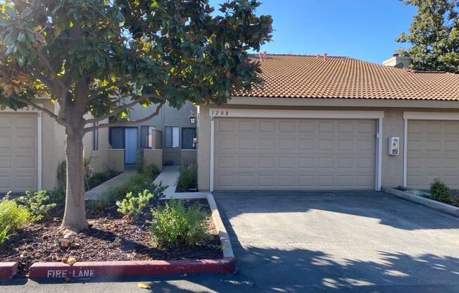 Two bedroom condo in Gated Community with 2 car garage!