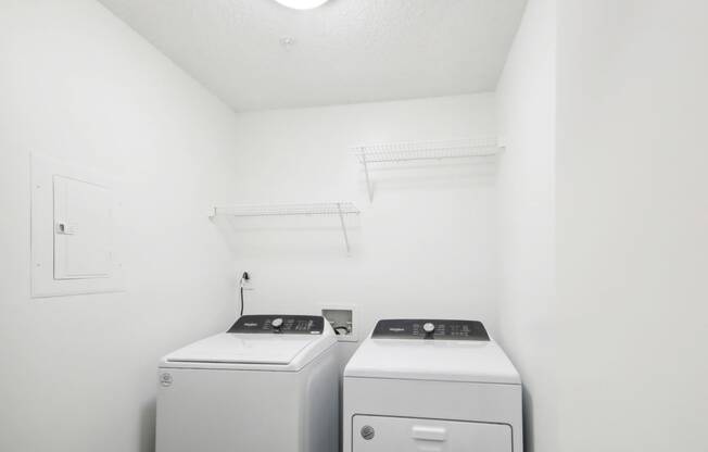 an empty laundry room at Arrowood Crossing in Charlotte, NC