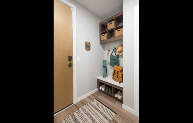 Built-in mudrooms with cubbies, and key drop