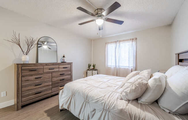 Bedroom inside a Sono Tempe apartment home in Tempe, AZ with neutral finishes and natural light.