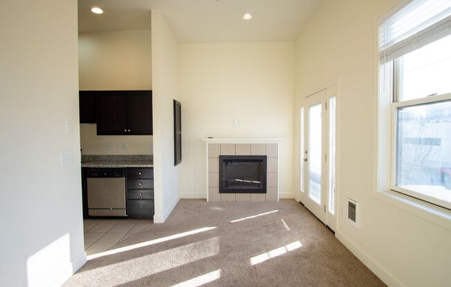 Corner 2 Bedroom with DW, W/D, Fireplace + Juliette Balcony!