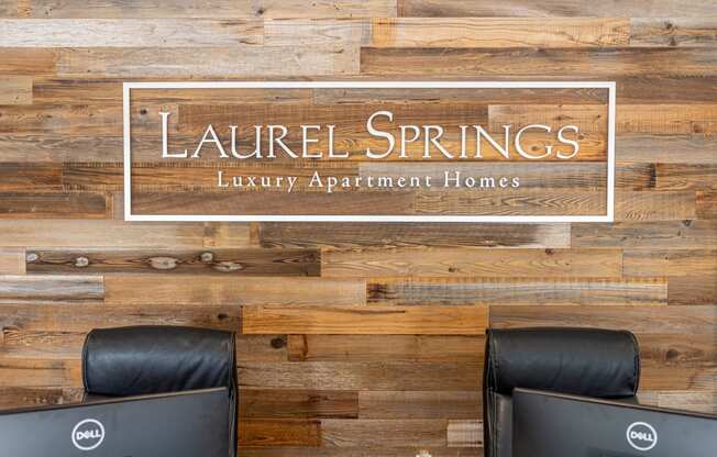 a sign that reads laurel springs luxury apartment homes