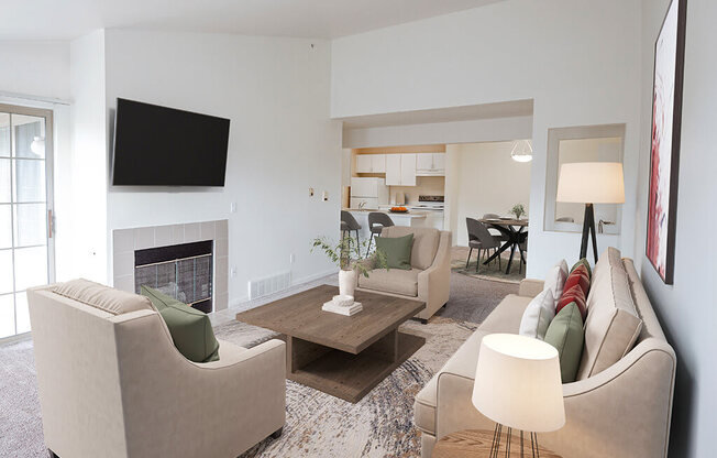 A living room with a fireplace, two couches, and a television.